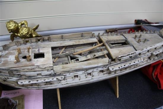 An 18th century wooden model of a thirty two gun Ship of The Line, length 3ft 2in.